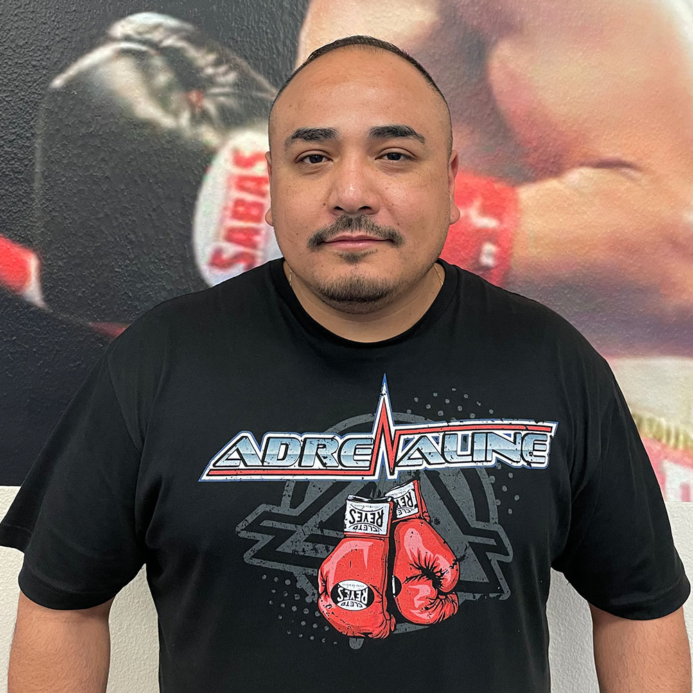 Head Boxing Coach Alfredo Barrera, embodying strength and dedication in a personal photo at Adrenaline MMA & Fitness